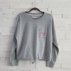 RAE DUNN SWEATSHIRT. DRAWSTRING BOTTOM. GREY AND PINK. SUPER SOFT. SIZE M